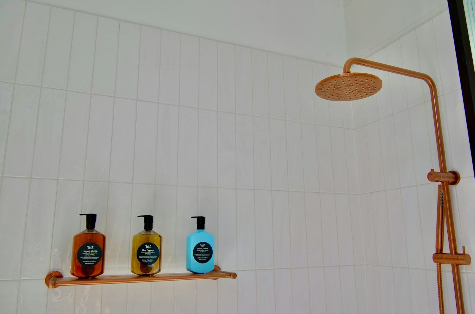 Rain shower with copper fittings and bath products